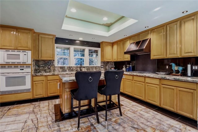 2611 Steeplechase Ln, Diamond Bar, CA 91765 - kitchen with white appliances, extractor fan, a tray ceiling, backsplash, and recessed lighting