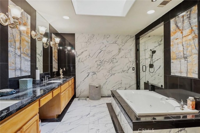 2611 Steeplechase Ln, Diamond Bar, CA 91765 - full bathroom with marble finish flooring, a whirlpool tub, stone wall, double vanity, and recessed lighting