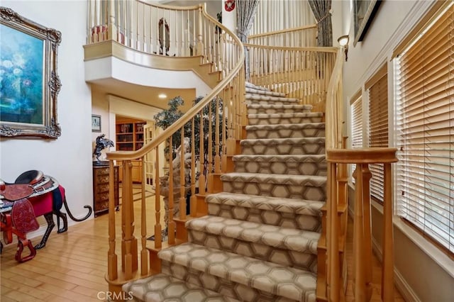 2611 Steeplechase Ln, Diamond Bar, CA 91765 - stairs featuring a towering ceiling and wood finished floors