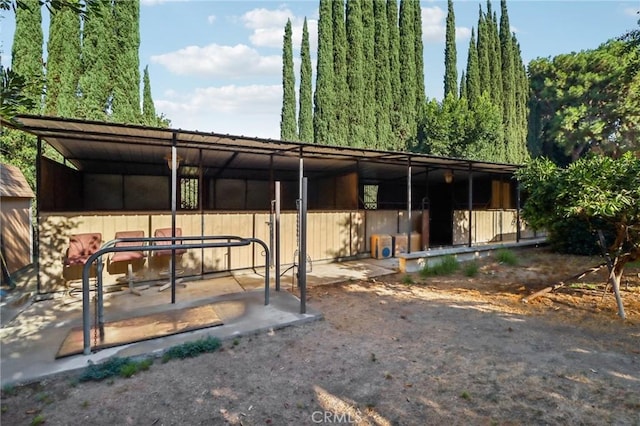 2611 Steeplechase Ln, Diamond Bar, CA 91765 - back of house with an exterior structure and an outbuilding