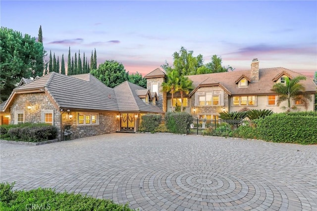 2611 Steeplechase Ln, Diamond Bar, CA 91765 - view of front of property featuring stone siding, a chimney, and fence