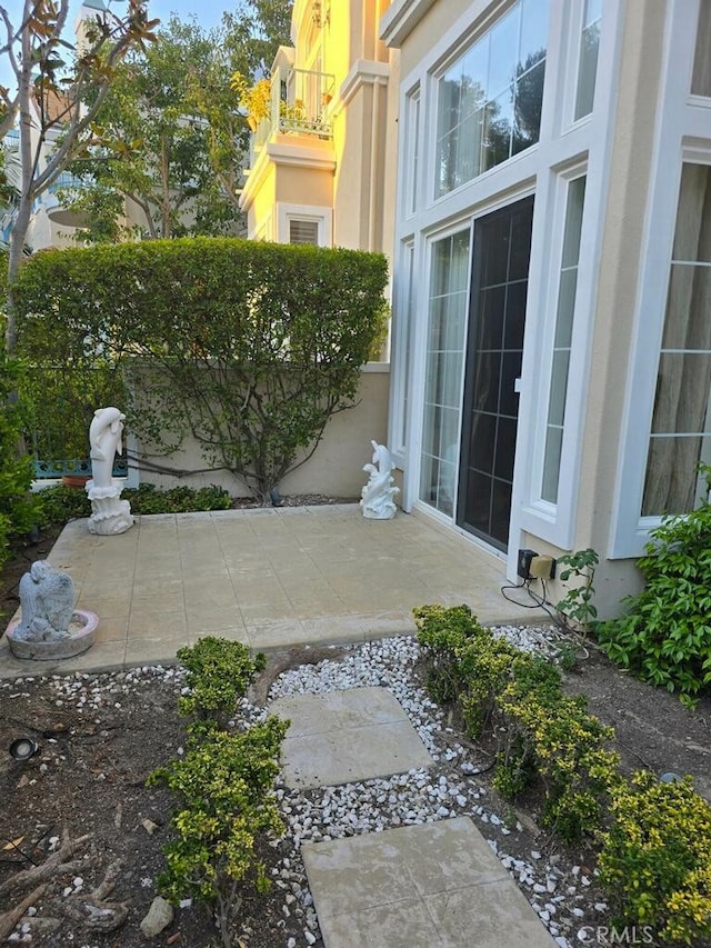 view of patio / terrace featuring a balcony