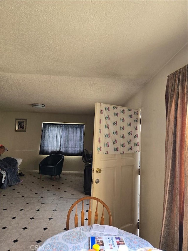 bedroom featuring a textured ceiling