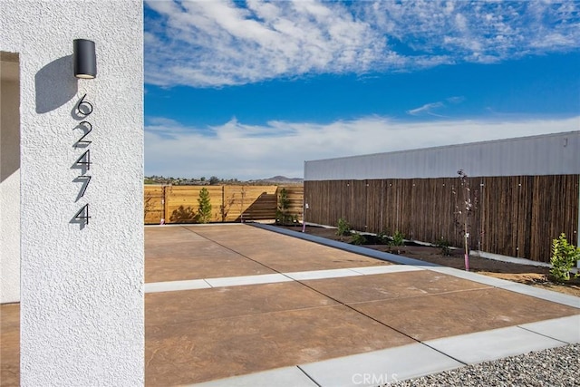 view of patio / terrace with fence