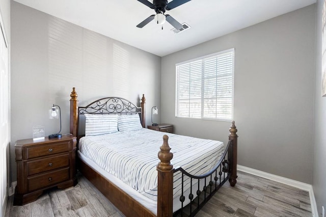 bedroom featuring ceiling fan and light wood-type flooring