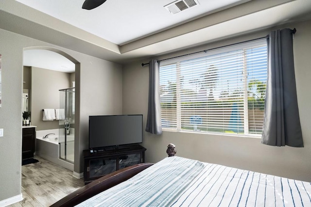 bedroom featuring ceiling fan and light hardwood / wood-style flooring