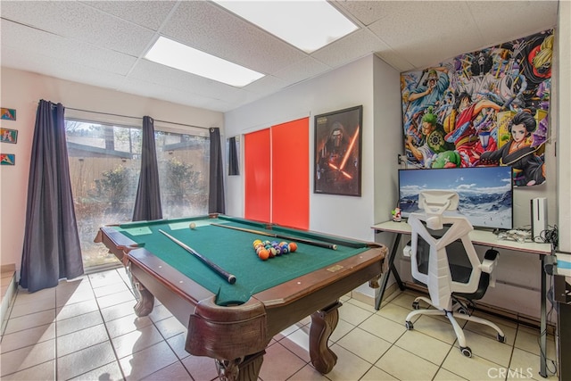 rec room with billiards, a drop ceiling, and light tile patterned floors