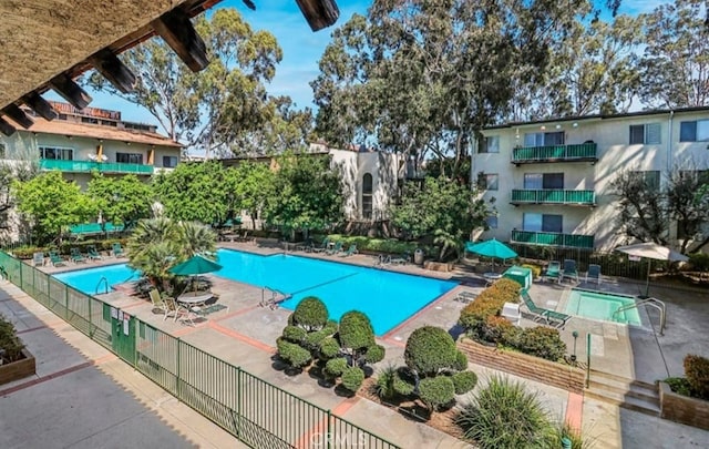 view of swimming pool with a patio area