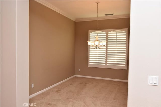 unfurnished room featuring carpet, a chandelier, and ornamental molding