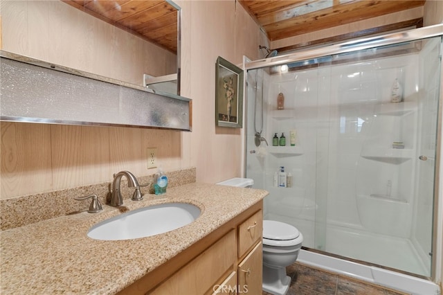 bathroom featuring a shower with door, wooden ceiling, vanity, and toilet