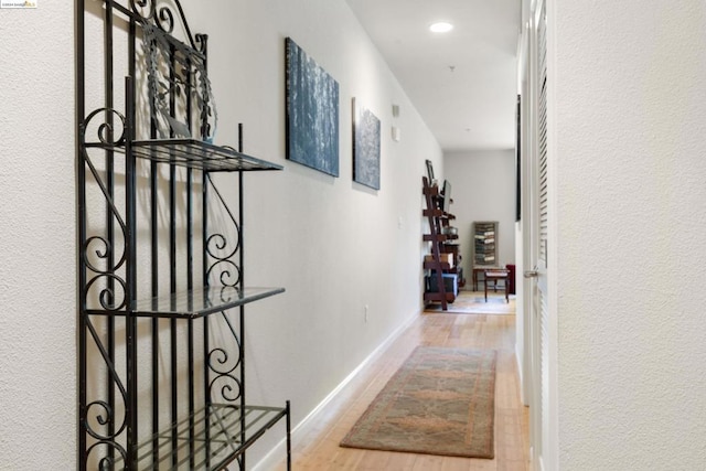 hallway featuring wood-type flooring