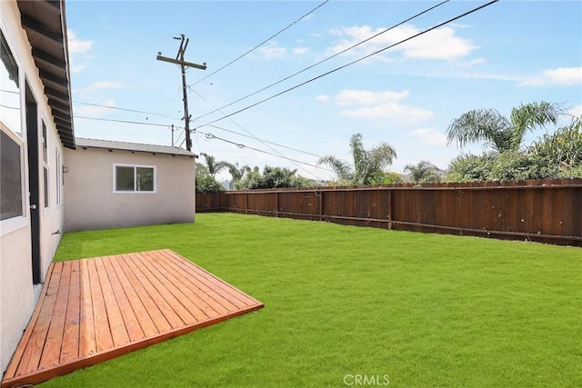 view of yard featuring a deck