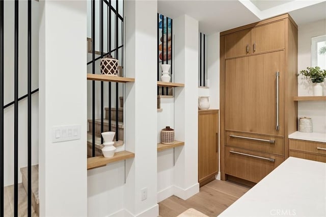 mudroom featuring light wood-style floors