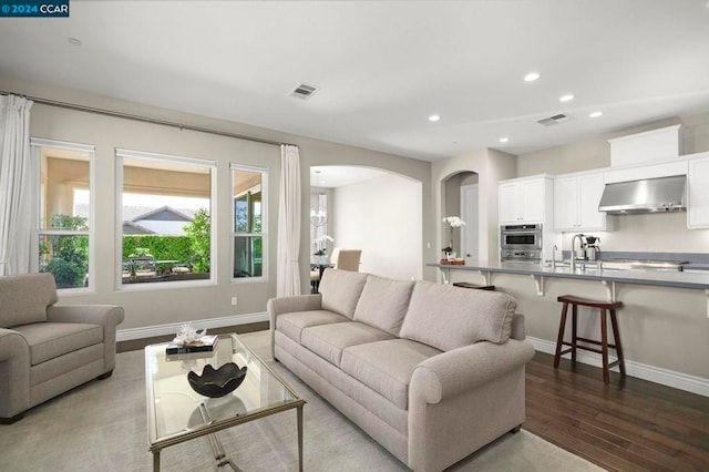 living room with light hardwood / wood-style flooring