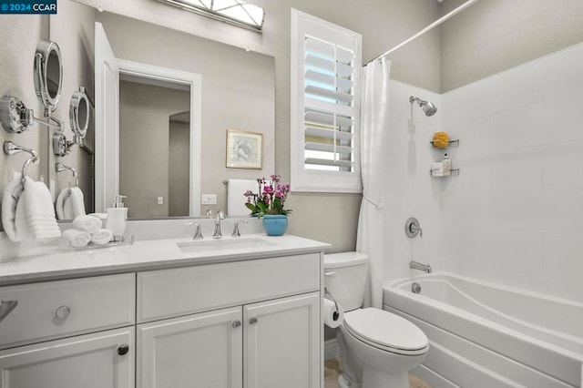 full bathroom with toilet, vanity, and shower / bath combination with curtain