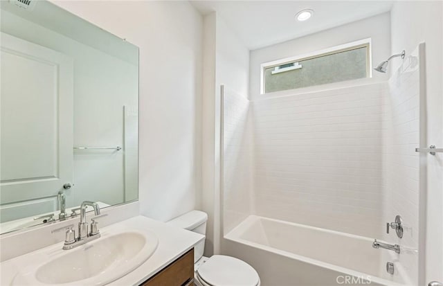 bathroom featuring shower / bath combination, recessed lighting, toilet, and vanity