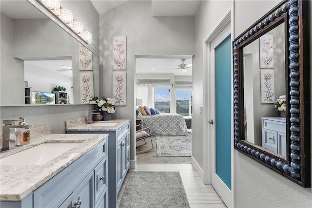 bathroom featuring vanity and ceiling fan