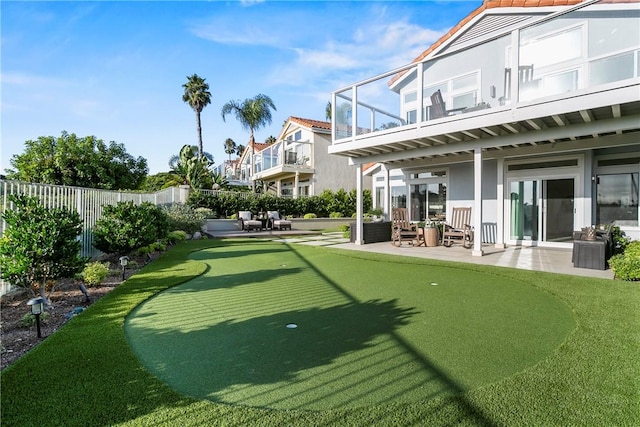 view of home's community with a patio