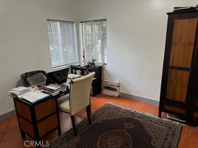 office space featuring hardwood / wood-style flooring