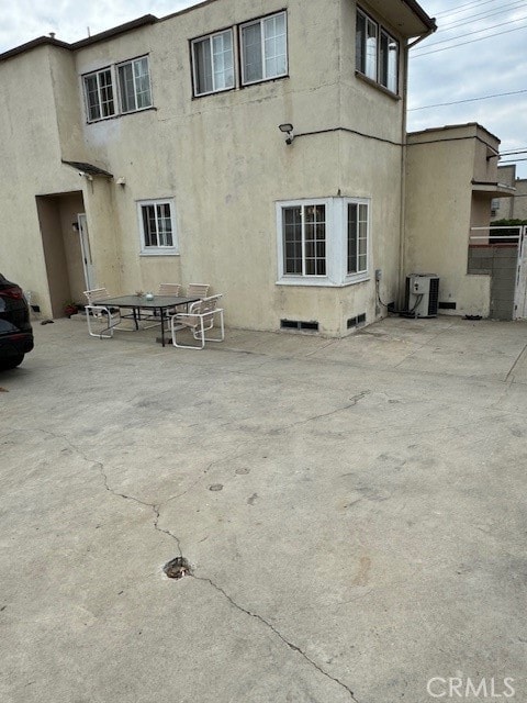 rear view of property with a patio area