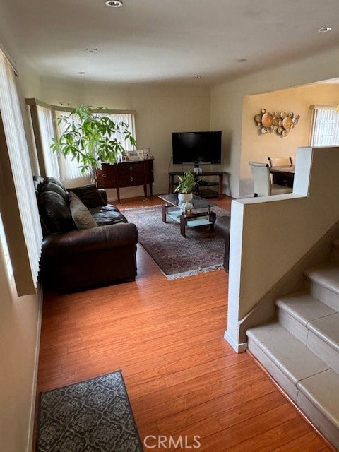 living room with light hardwood / wood-style floors