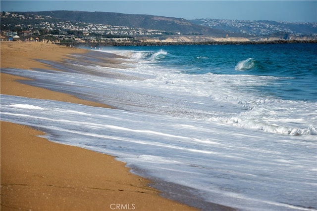 view of water feature with a view of the beach