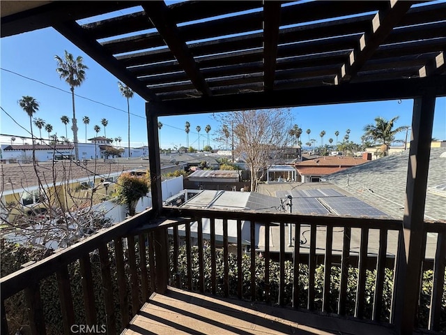 wooden deck with a pergola