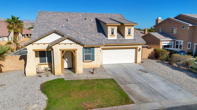 view of front of home featuring a garage