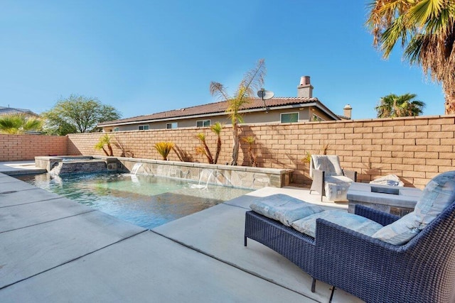 view of swimming pool with an in ground hot tub and pool water feature