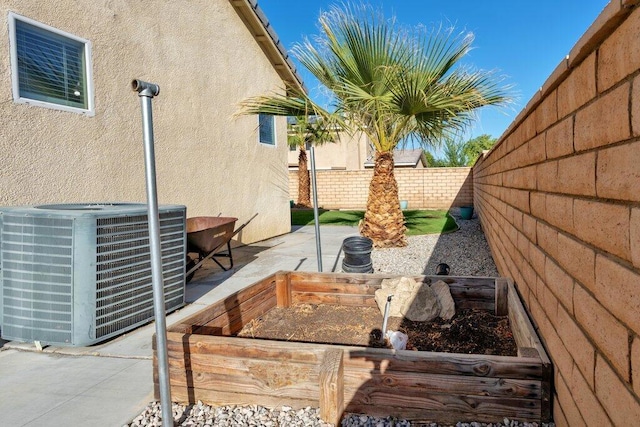 view of yard featuring central air condition unit