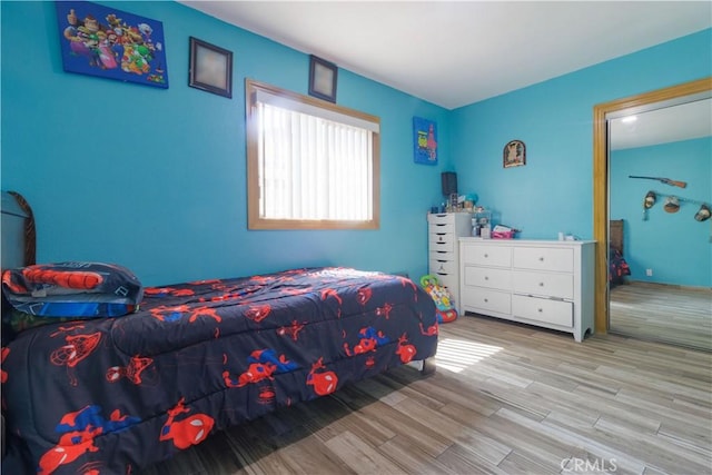 bedroom featuring light wood-type flooring