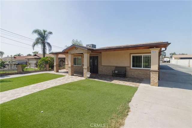 view of front of home with a front yard