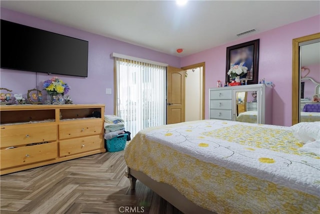 bedroom with parquet floors