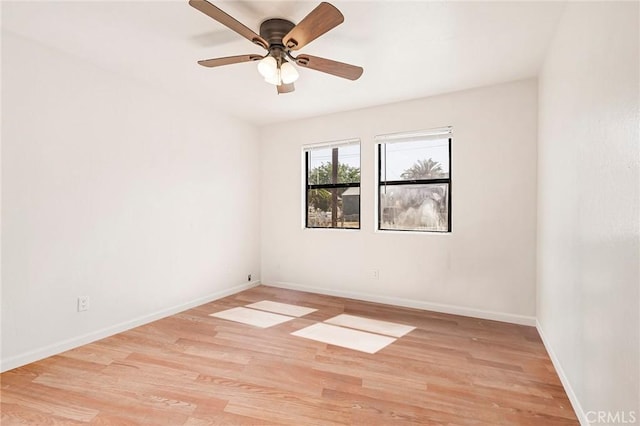 unfurnished room featuring ceiling fan and light hardwood / wood-style flooring