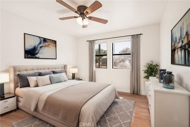 bedroom featuring ceiling fan and light hardwood / wood-style floors