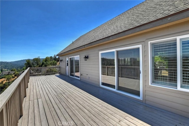 wooden terrace with a mountain view