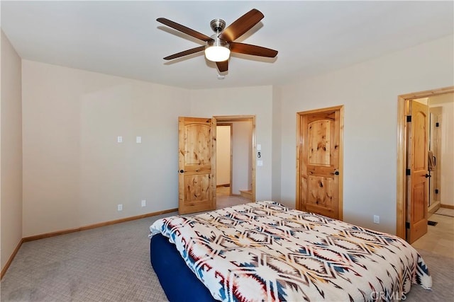 bedroom featuring ceiling fan and light colored carpet