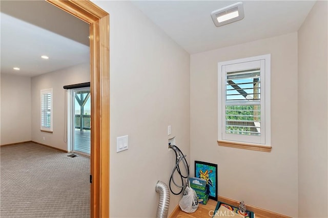 interior space featuring carpet flooring and washer hookup