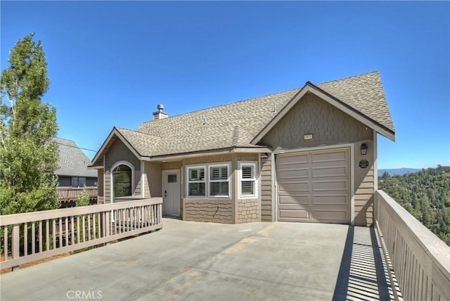 view of front of property featuring a garage