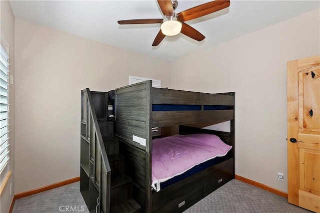 bedroom with light carpet and ceiling fan