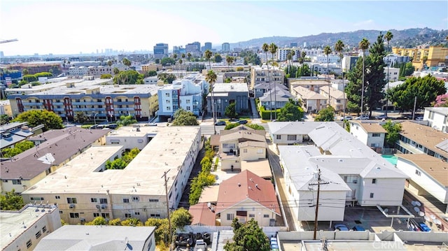 birds eye view of property featuring a mountain view