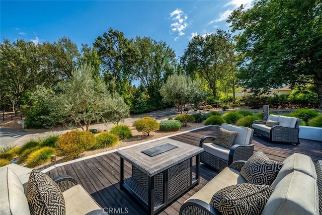 view of patio / terrace featuring outdoor lounge area and a wooden deck