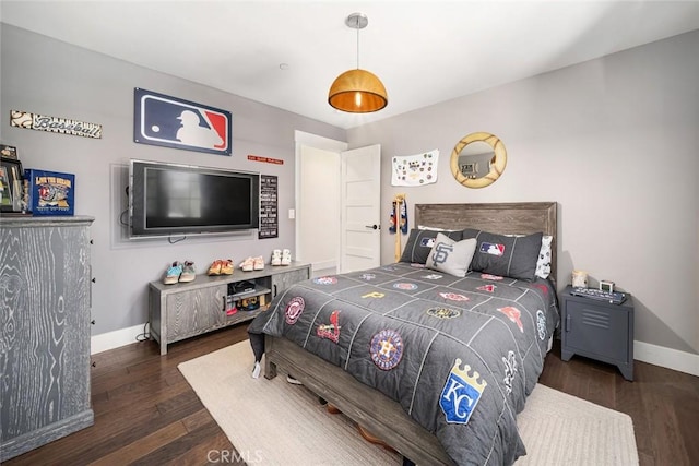 bedroom featuring dark wood-type flooring