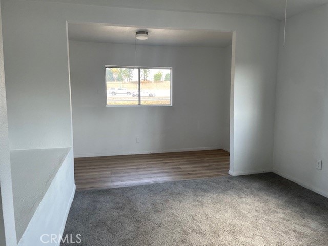 empty room featuring hardwood / wood-style floors