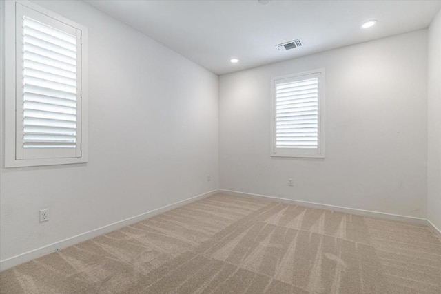 view of carpeted spare room