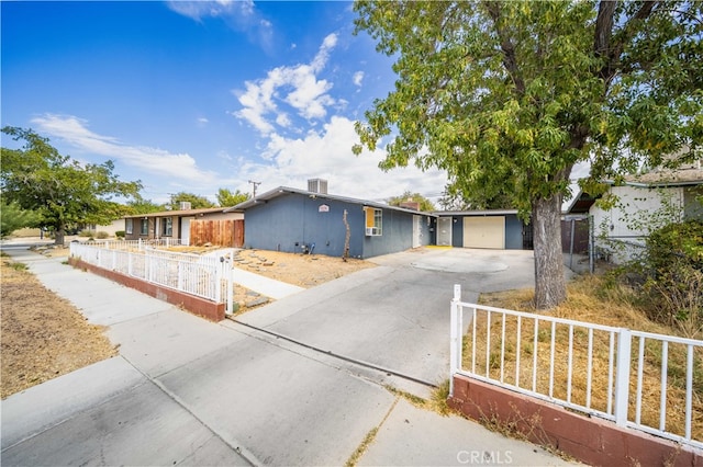 single story home with a garage