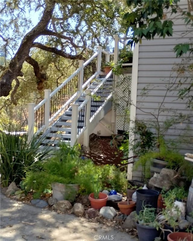 view of property exterior with stairs