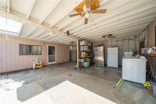 view of patio / terrace with ceiling fan and washer / clothes dryer