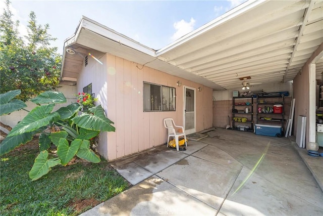 view of side of property featuring a patio area