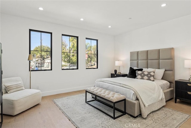 bedroom featuring light hardwood / wood-style flooring